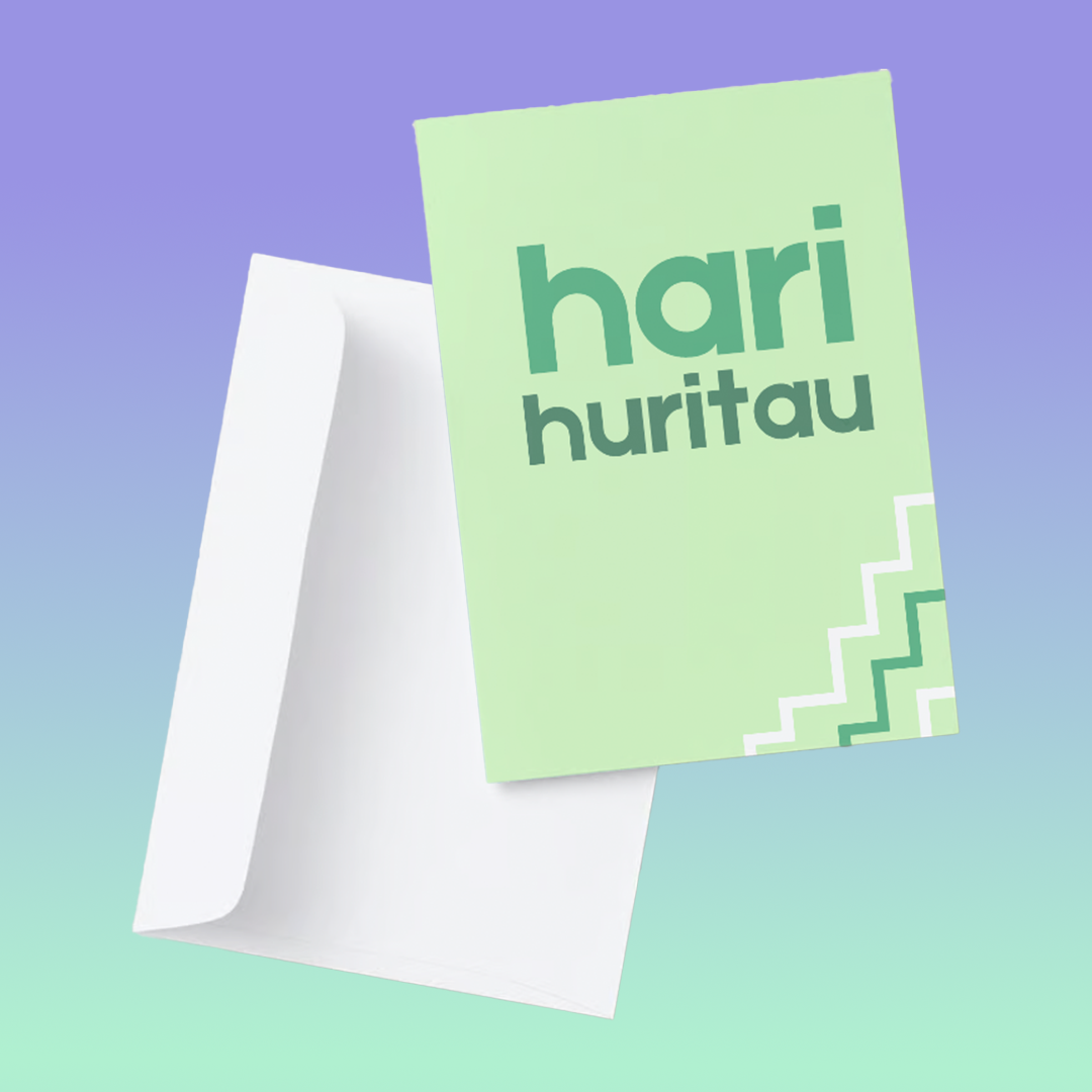 Green Birthday te reo Māori Card reads "Hari Huritau" on the front and has a white and green Poutama design on the bottom right hand corner. It is pictured in front of a white envelope.